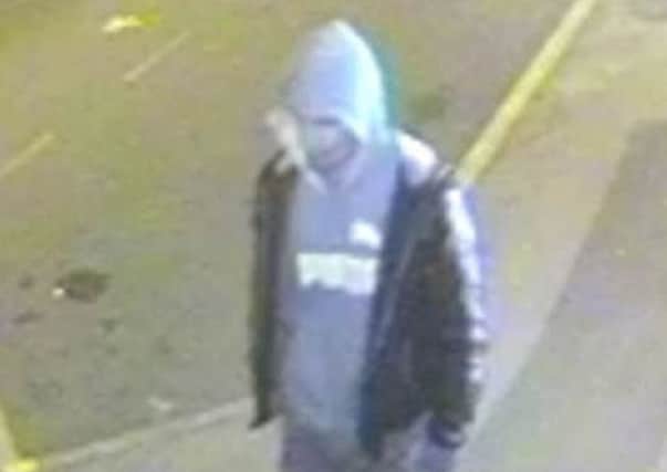 A police CCTV image of the suspect, issued during the inquiry