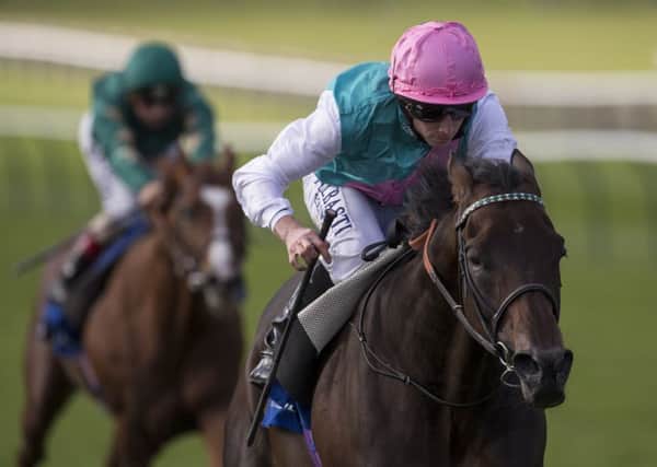 Time Test ridden by Ryan Moore wins the Shadwell Joel Stakes Race run during day two of The Cambridgeshire Meeting at Newmarket Racecourse.