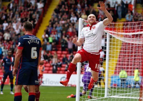 Conor Sammon of Sheffield Utd jumping for joy after scoring the second goal against Doncaster Rovers.