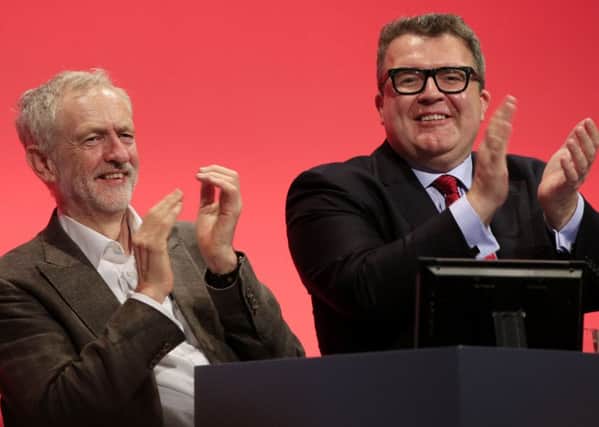 Jeremy Corbyn with deputy leader Tom Watson during the Labour Party annual conference in Brighton