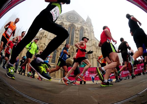 Runners make ther way past York Minster during last year's Yorkshire marathon.Picture by Simon Hulme