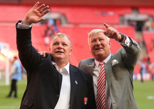 Steve Evans and Tony Stewart celebrate promotion to the Championship at Wembley