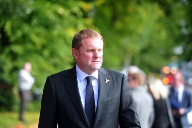 Sit Gary Verity arrives for the  memorial service