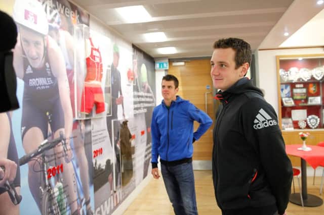 Alistair and Jonny Brownlee at the renamed Brownlee pavilion at their former school.