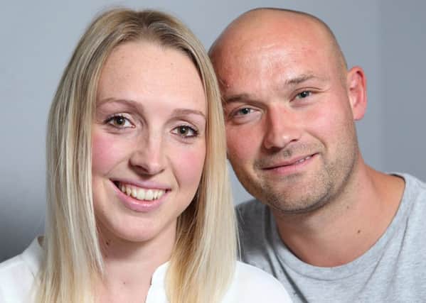 Jade Hartley, 25, and her partner, Brett Crisp, 32, are expecting a baby next year after conceiving by IVF. Picture: Ross Parry Agency