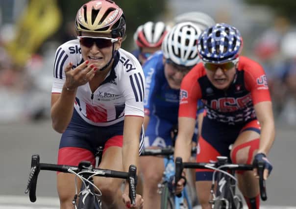 Tears of joy: The enormity of the accomplishment hits Lizzie Armitstead as she wins the world title in Richmond. (Picture: AP)