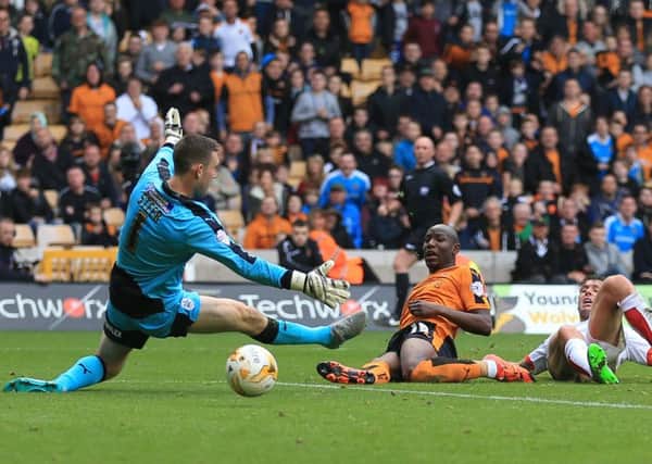 GAME OVER:  Wolverhampton Wanderers Benik Afobe scores his sides third goal past Towns Aston Villa loanee Jed Steer. Picture: PA