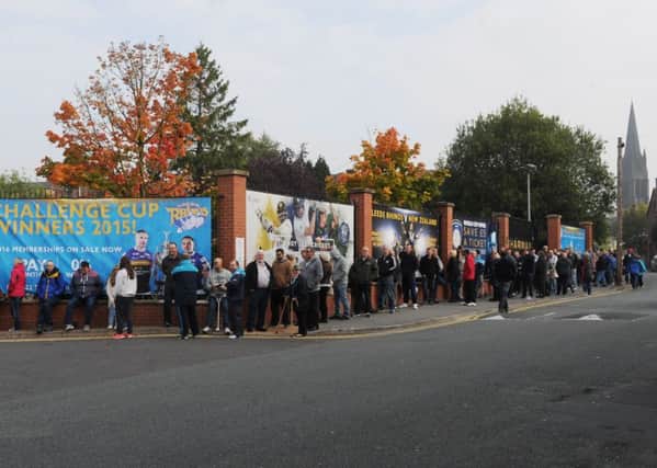 Leeds Rhinos fans queue for Grand Final tickets.