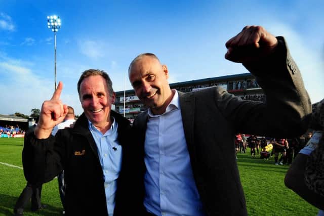 SURVIVORS: Wakefield Wildcats Brian Smith, head coach and club chairman Michael Carter, celebrate their team's win.