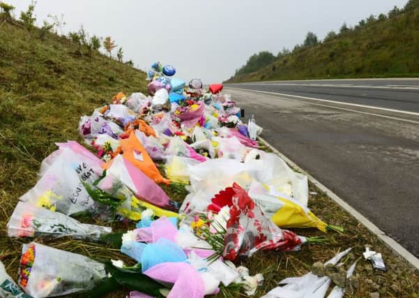 1 oct 2015...flowers at the scene of a RTA near Hemsworth where four people died when a quad bike collided with a sports car. Picture Scott Merrylees SM1009/67a
