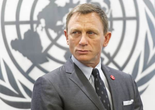 Is Daniel Craig looking forward to another outing as James Bond? See question 11. (Mark Garten/United Nations via AP)