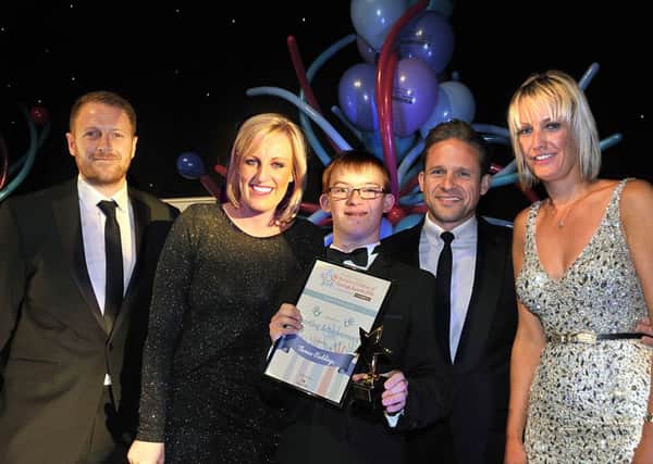 REWARDING: Thomas Raddings receives an award in 2014 from Yorkshire cricket captain Andrew Gale, host Steph McGovern and awards supporters Nik Enthwistle, Louise Woollard.