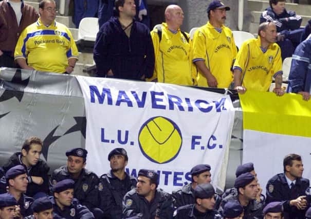 Leeds United's fans look over the Turkish police at besiktas in October 2000.