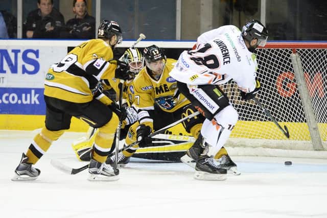 MAIN MAN: Sheffield Steelers' Chris Lawrence scores what proved to be the game-winning goal in a 3-2 win against his former club, Nottingham Panthers, on Saturday night. Picture: Dean Woolley.