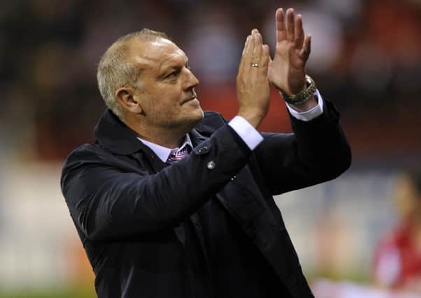 Neil Redfearn applauds the 
Rotherham fans after the 1-1 draw.