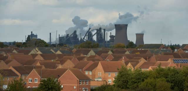 A view of the Tata Steel Plant in Scunthorpe, as fears about fresh job losses in the steel industry have been confirmed after Tata announced plans to cut 1,200 posts. PRESS ASSOCIATION Photo. Picture date: Tuesday October 20, 2015. Around 900 jobs will be cut from the firm's giant plant in Scunthorpe, with 270 in Scotland and a small number in other sites. See PA story INDUSTRY Steel. Photo credit should read: Anna Gowthorpe/PA Wire