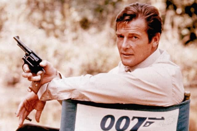 Roger Moore, in character, on location in 1972. (AP Photo)
