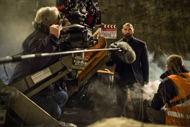 Bond villain Dave Bautista in Everest tailoring on the set of Spectre.