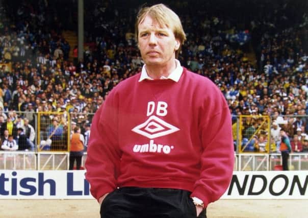 Dave Bassett explains in his new book, inset, that he followed the example of Don Revies Leeds United when helping to lift Wimbledon from the depths of non-league football into the games top flight. main Picture: ASP