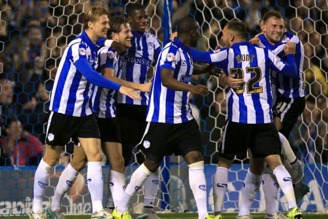 Sheffield Wednesday's Sam Hutchinson (second left) celebrates scoring his side's third goal of the game.