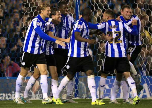Sheffield Wednesday's Sam Hutchinson (second left) celebrates scoring his side's third goal of the game.