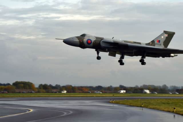 Vulcan XH558, a restored nuclear bomber, on its final flight at Doncaster's Robin Hood Airport.