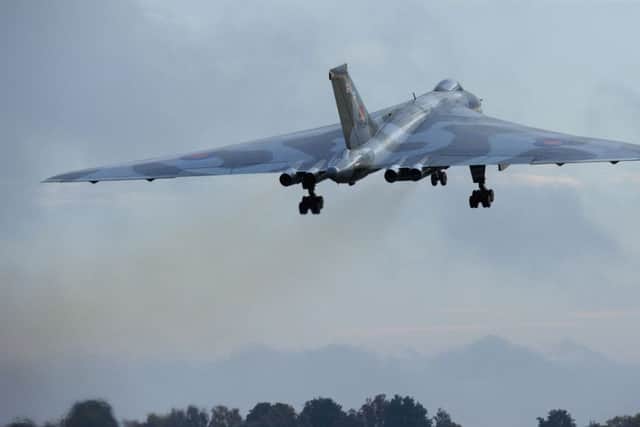 Vulcan XH558, a restored nuclear bomber, on its final flight at Doncaster's Robin Hood Airport.