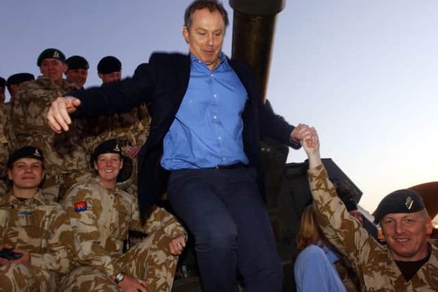 Tony Blair meeting British troops on a visit to Baghdad in 2004