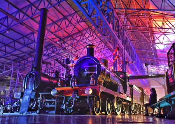 The final touches are made to the Locos in a Different Light installation in the National Railway Museum in York.