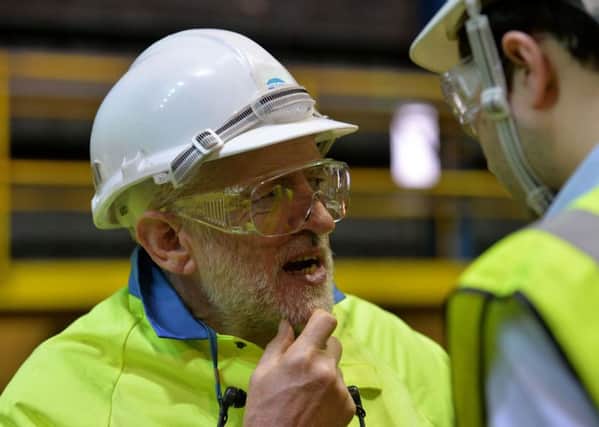 Labour Party leader Jeremy Corbyn tours the Plate Mill during a visit to Tata Steel's Scunthorpe site. PRESS ASSOCIATION Photo. Picture date: Thursday October 29, 2015. Thousands of job cuts have been announced by Tata Steel and SSI in Redcar, Scunthorpe and Scotland in recent weeks, with cheap imports and high energy and emissions costs being blamed. See PA story POLITICS Steel. Photo credit should read: Anna Gowthorpe/PA Wire