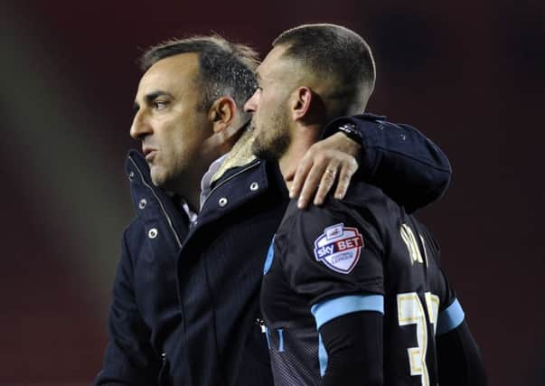 Sheffield Wednesday head coach Carlos Carvalhal, left, has earned the respect of attacking full-back Jack Hunt, right (Picture: Steve Ellis).