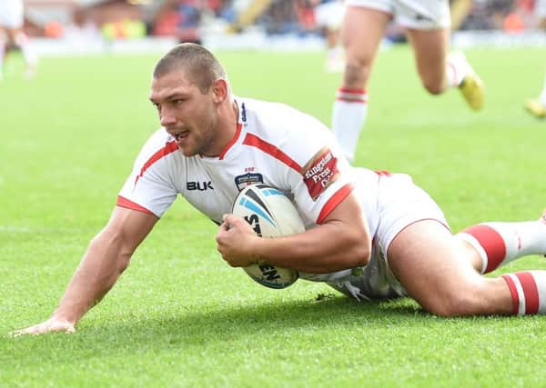 England's Ryan Hall goes over for a try during the International Test match at Leigh Sports Village.