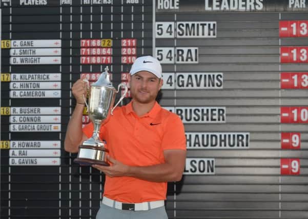Jordan Smith with the HotelPlanner.com PGA EuroPro Tour's Matchroom Sport Tour Championship trophy.