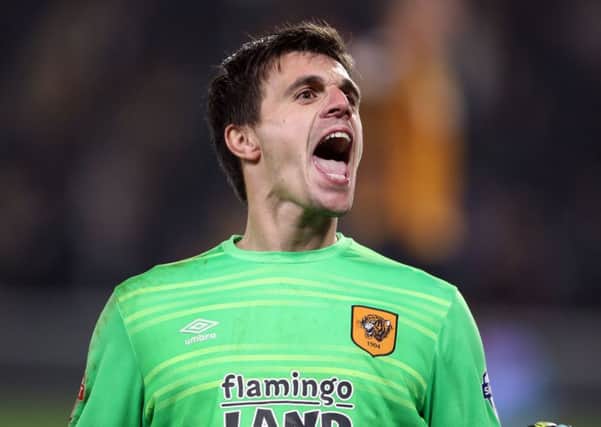 Eldin Jakupovic, who helped Hull City win their League Cup penalty shoot-out, will be a substitute against MK Dons.