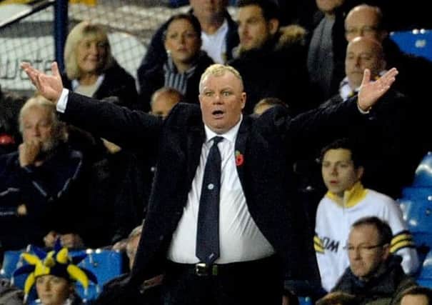 United's head coach Steve Evans shouts out the orders, in his first match in charge at Elland Road.
 (Picture: Jonathan Gawthorpe)