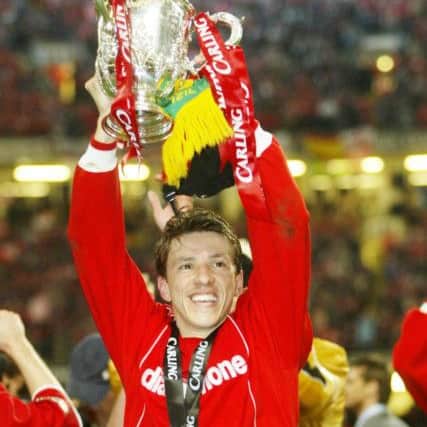 Middlesbrough's Juninho holds aloft the Carling Cup after the match against Bolton Wanderers, during the Carling Cup final at the Millennium Stadium, Cardiff, Sunday February 29, 2004. (Picture: PA)