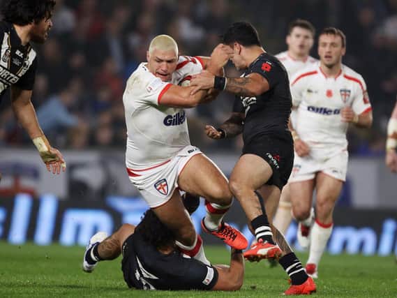 Englands Ryan Hall is tackled by New Zealands Issac Luke and Tohu Harris in last nights first Test in Hull (Picture: Richard Sellers/PA Wire).