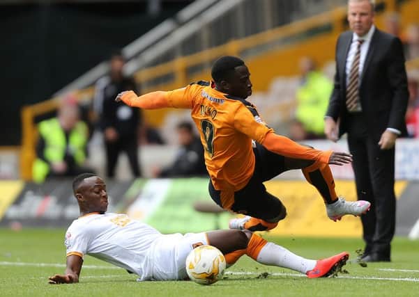 Wolverhampton Wanderers' Nouha Dicko and Hull City's Moses Odubajo