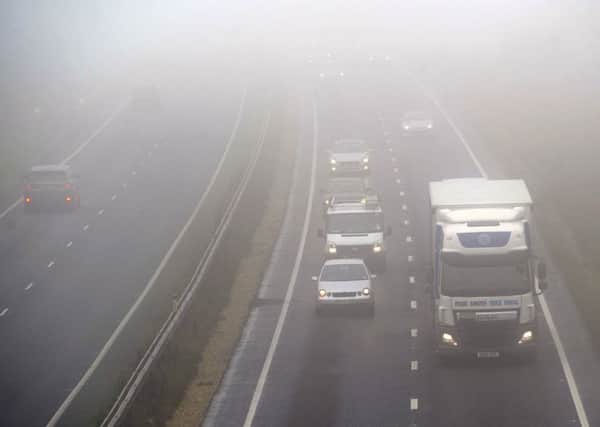 Dense fog affecting driving conditions around West and North Yorkshire, pictured motorists travelling on the A64. PIC: James Hardisty
