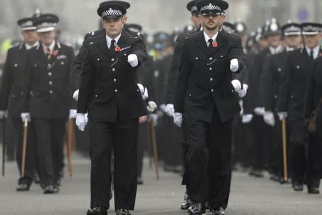 Merseyside Police officers follow the coffin of Pc Dave Phillips as it makes its way to Liverpool's Anglican Cathedral for his funeral after he was killed in a hit-and-run.