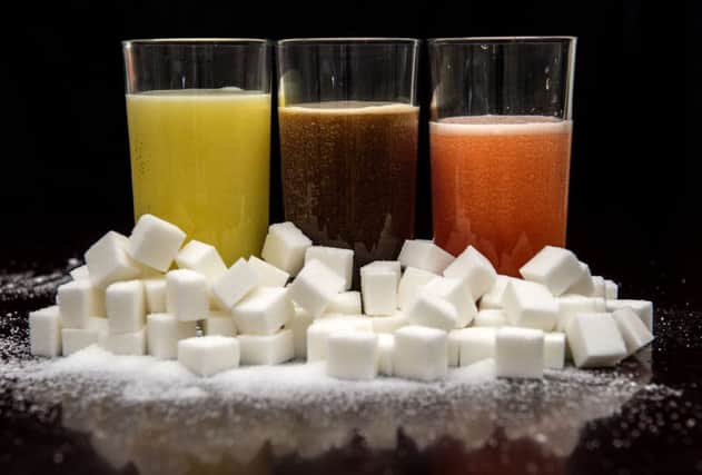 Drinking two or more glasses of fizzy or sweetened drinks a day is linked to an increased risk of heart failure, experts have warned.