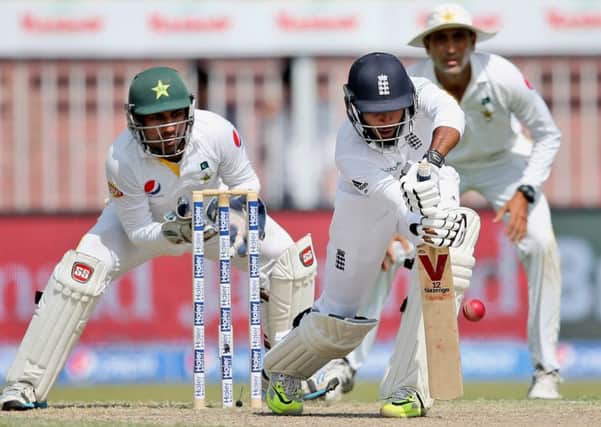 FORWARD DEFENSIVE: Yorkshires Adil Rashid bats on day three of Englands Test with Pakistan. Picture: AP.