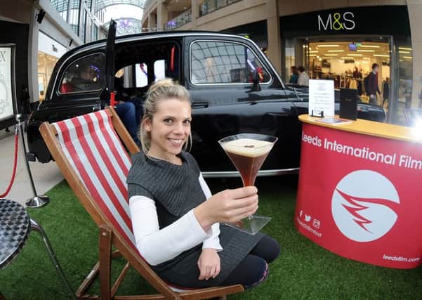 Leora Bermeister pictured with a cocktail by the Smallest Cinema, which is a London Taxi, at the Trinity Shopping Centre,Leeds...SH10014386k..4th November 2015 Picture by Simon Hulme