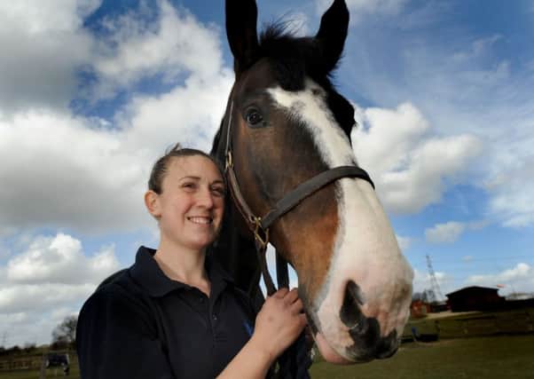 Police horse Bud and groom Isabel Collins at Carr Gate, Wakefield.