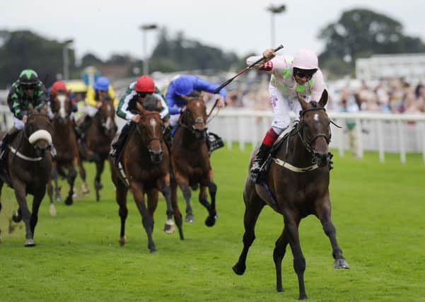 Frankie Dettori celebrates his victory on Max Dynamite in the Lonsdale Cup on day three of the Ebor Festival at York in  August. Picture: John Giles/PA.