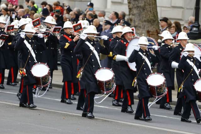 A band marches before the annual Remembrance Sunday service at the Cenotaph memorial in Whitehall, central London, held in tribute for members of the armed forces who have died in major conflicts. PRESS ASSOCIATION Photo. Picture date: Sunday November 8, 2015. See PA story MEMORIAL Remembrance. Photo credit should read: Gareth Fuller/PA Wire