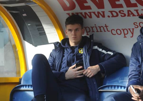 Sam Byram on the bench at Huddersfield.