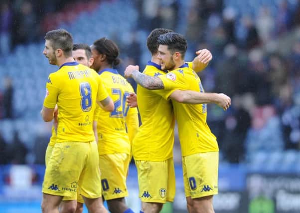 NICE ONE: Leeds United's players celebrate their 3-0 win over Huddersfield Town at John Smith's Stadium. Picture: Simon Hulme