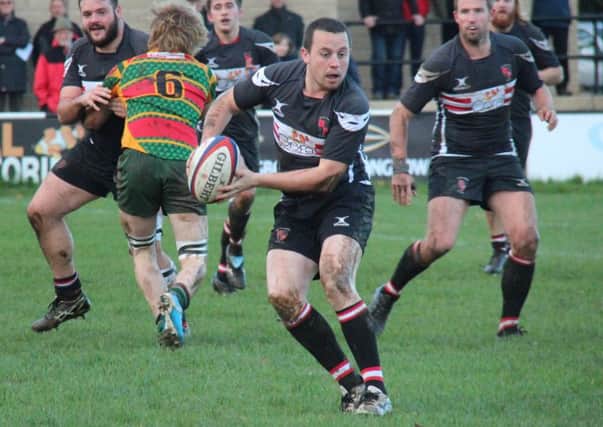Assessing his options: Liam Scott during Old Brodleians defeat of Selby on Saturday.