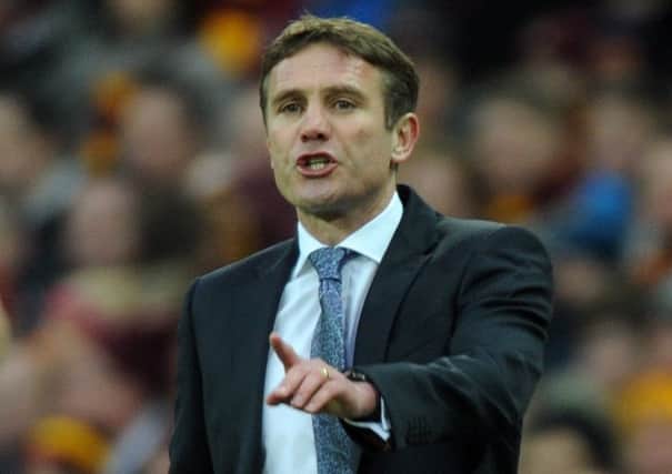 Phil Parkinson's Bradford City will face Chesham if they beat Aldershot in a first round replay. Picture: Tony Johnson.